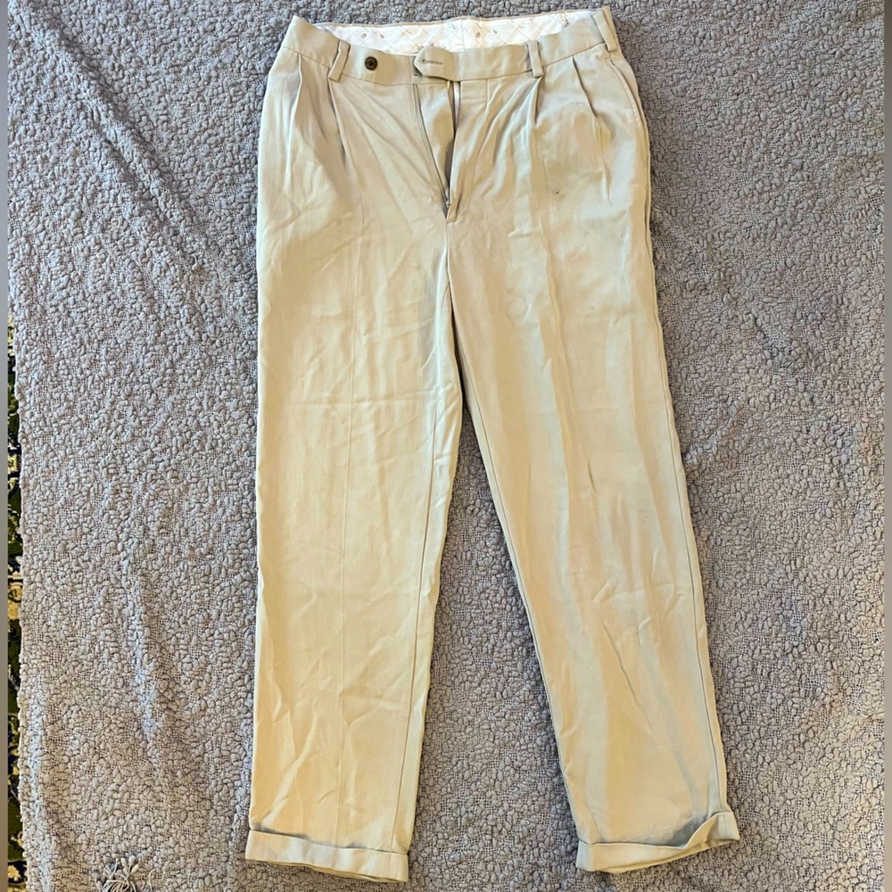 Tan, pleated pants!